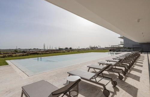 Armacao de Pera Apartamento | Bayline Algarve Apt – Beachfront, Spa, Lagoon View