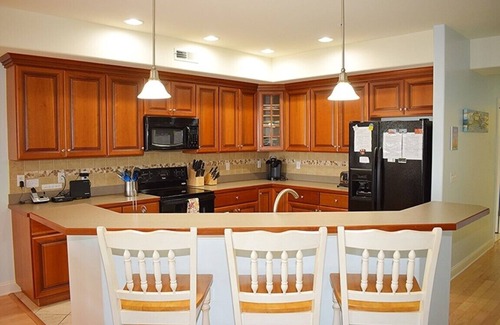 Chincoteague Villa | Bayside & Beyond-Sunset Bay Villa #105- Waterfront with Boat Slip