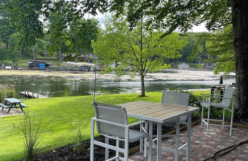 Ludington Cabaña | Bayside cottage is our new Hamlin lake cottage. Complete with docks 50’ away.
