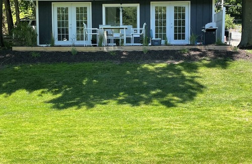 Ludington Cabaña | Bayside cottage is our new Hamlin lake cottage. Complete with docks 50’ away.
