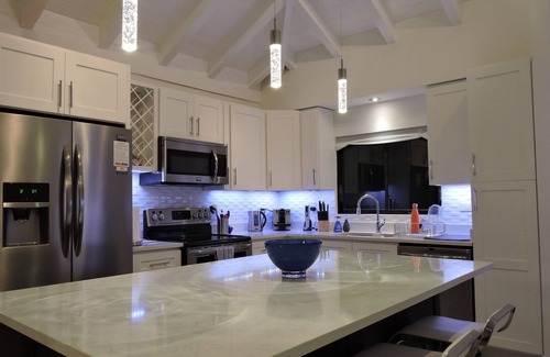 Seven Mile Beach Condominio | Condominio de playa con vista al atardecer