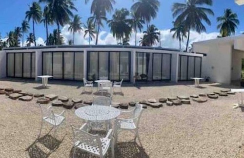 Nagua Apartamento | Beach hotel , one mile of beach front hotel, bar , beach club/restaurant