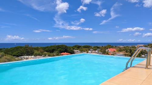Flic-en-Flac Apartamento | Beach house apartment with pool