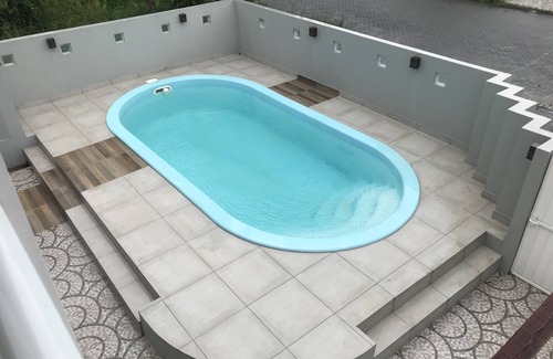 Daniela Casa | casa de playa con piscina, zona de barbacoa y un parque, a 250 metros de la playa.