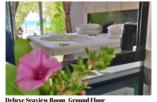 Dhiffushi Hotel | Beach Villa Hotel in Maldives. Just in front of beautiful beach.