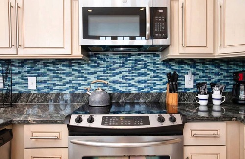 Fort Morgan Casa | Beach Walk Retreat Heated Pool Golf Views Main Guest House Sleeps 15