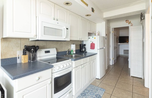 Crescent Beach Condominio | Beachers 'Lodge # 402 condominio de un dormitorio en el ��ltimo piso con una impresionante vista frente al mar