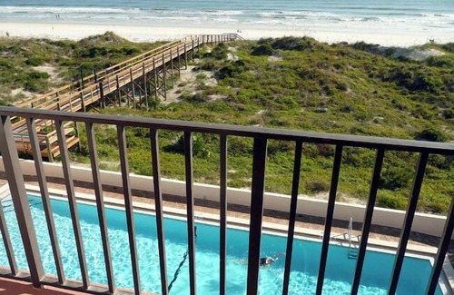 Crescent Beach Condominio | Beachers 'Lodge # 402 condominio de un dormitorio en el ��ltimo piso con una impresionante vista frente al mar