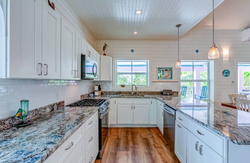Hope Town Casa | Beachfront 4 bed 3 bath luxury home with dock access, Hope Town settlement area