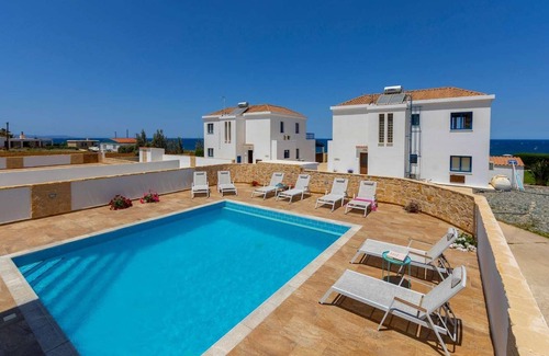 Pomos Villa | Beachfront 4 bed villa with sea views.
