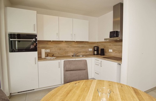 Moenchgut Peninsula Apartamento | Beachfront apartment with balcony, use of swimming pool and sauna - Rex Rugia apartment 12-8 -