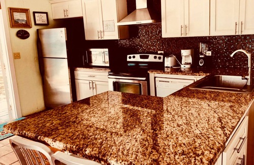 Port Howe Casa | Banana Wind frente al mar Island Getaway