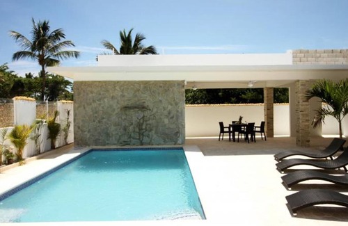 Cabarete Apartamento | Beachfront bedroom in cozy villa with pool