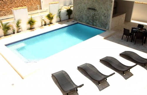 Cabarete Apartamento | Beachfront bedroom in cozy villa with pool