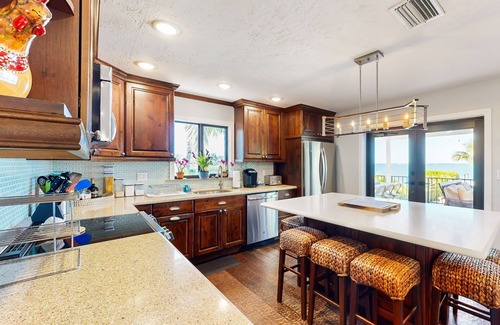 Bowens Addition Casa | Beachfront charmer with dock, furnished balcony, firepit, & W/D - dog-friendly