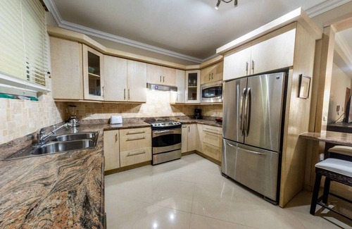 Playa Chiquita Apartamento | Beachfront condo in downtown Sosua, guest-friendly, sea views