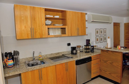 Dominicus Condominio | Beachfront Bliss: Cozy 2-Bedroom Rental Sleeps 4-6 with the sand 10 meters away