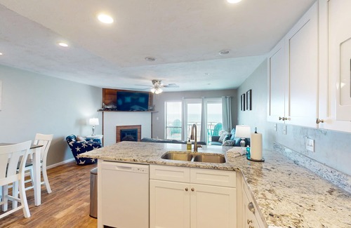 East End Casa | Beachfront East End townhouse with beach views, deck, on-site pool & grills