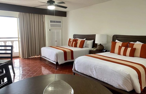 Zona sur Hotel | Beachfront Getaway with Panoramic Views | Outdoor Pools, Near Malecon Boardwalk