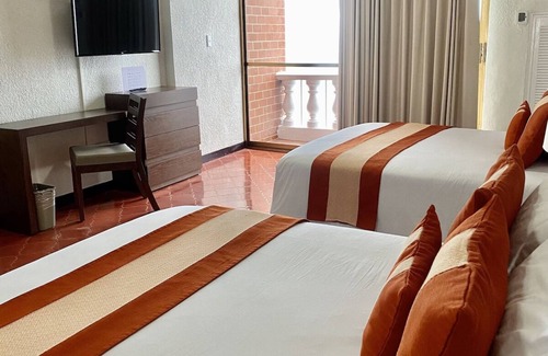 Zona sur Hotel | Beachfront Getaway with Panoramic Views | Outdoor Pools, Near Malecon Boardwalk