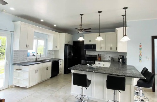 Caribbean Way Villa | Beachfront Home w/ Pool, Volleyball & Rooftop View