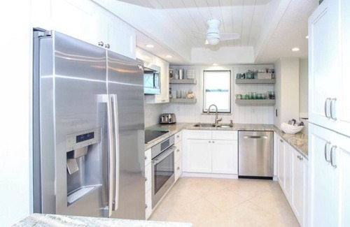 Hutchinson Island South Villa | Beachfront, ocean views, gated beach entry, walk to restaurants, boutique decor