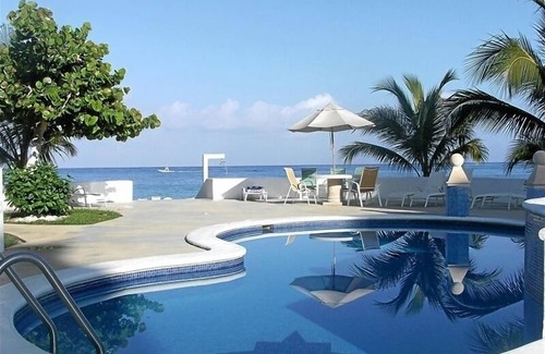 Cozumel Condominio | Condominio frente al mar - Playa de arena con excelente snorkel!