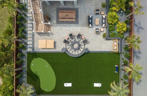 Folly Beach Casa | Beachfront Pool Outdoor Kitchen Firepit Putting Green