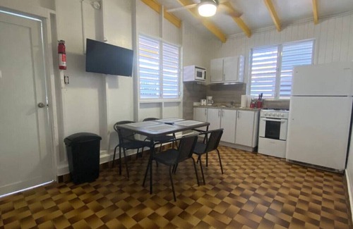El Combate Cabina | Beachfront Rustic Cabin by Sunset Village - Yellow
