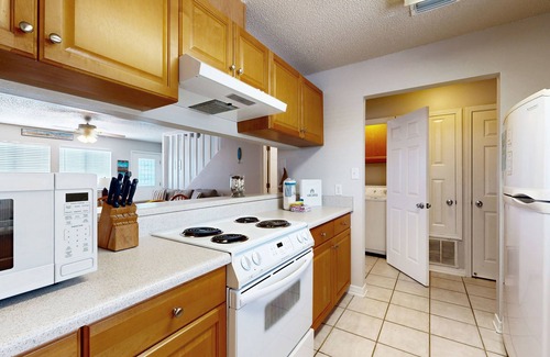 Sugar Beach Casa | Beachfront townhome w/ on-site beach access, heated pool, patio, grill, AC, W/D