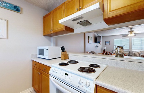 Sugar Beach Casa | Beachfront townhome w/ on-site beach access, heated pool, patio, grill, AC, W/D
