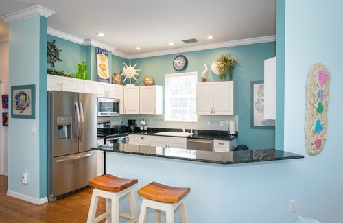 Ilexhurst Casa | Junto a la playa: 3 BR / 3 BA casa en Holmes Beach, para 8 personas