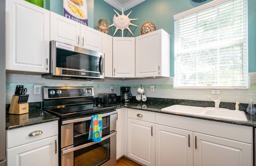 Ilexhurst Casa | Junto a la playa: 3 BR / 3 BA casa en Holmes Beach, para 8 personas