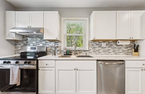 Kansas City Casa | Beachy Haven Duplex - 3BR/2BA, Pet-Friendly with Firepit