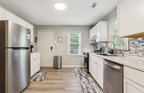 Kansas City Casa | Beachy Haven Duplex - 3BR/2BA, Pet-Friendly with Firepit