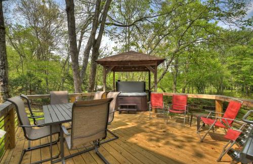 Epworth Villa | Bear Naked Hideaway - Relax in the hot tub with sounds from the nearby creek