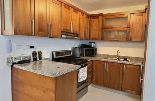 Llanos de Gurabo I Condominio | Beautiful warm condo with pool