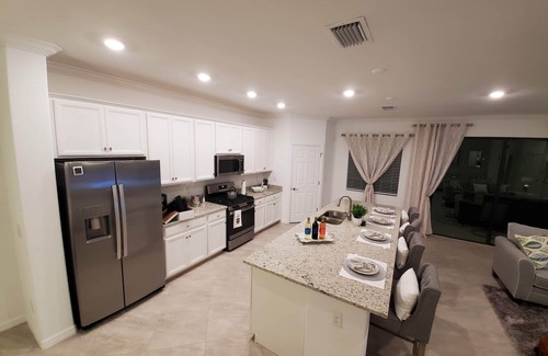 Lakewood Ranch Condominio | Beautiful 2nd Floor Coach Home at Lakewood National with West Facing Lanai View