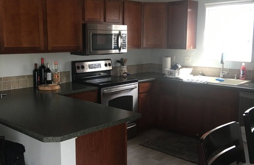 Key Largo Village Casa | HERMOSO 3/2 en el canal. Jacuzzi, playa privada con acceso al mar. Listo para R & R!