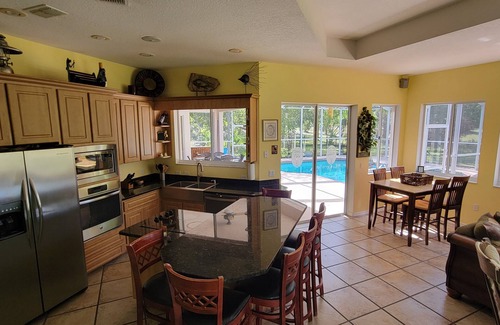 Spring Hill Casa | Beautiful 4 BR-2.5 Bath-Office-Golf Course-Pool-Hot Tub-Sleeps 9-Dog Friendly!