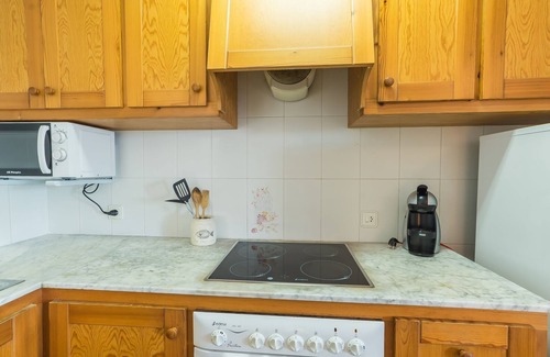 Arenal d'en Castell Apartamento | Hermoso apartamento con Wi-Fi, piscina, terraza y vista al mar