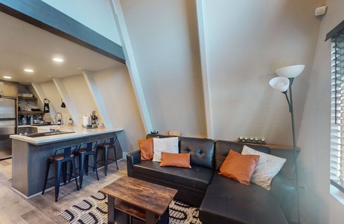 West Village Cabina | Beautiful A-frame home with spacious deck, firepit, loft, & nearby activities
