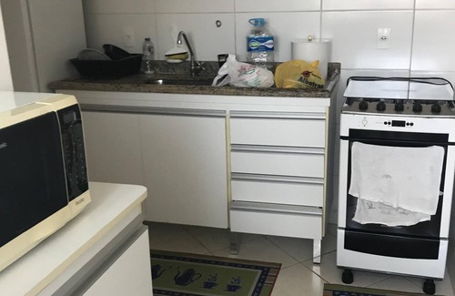 Bertioga Apartamento | Lindo apartamento 50 m de la playa en el condominio Terraza de Maitinga