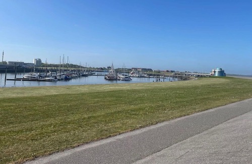 Norddeich Apartamento | Hermoso apartamento para 4 personas con WIFI, TV, balcón, mascotas permitida y aparcamiento
