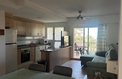 Platja de Piles Apartamento | Beautiful apartment in 1st line with sea view, swimming pool and palm trees