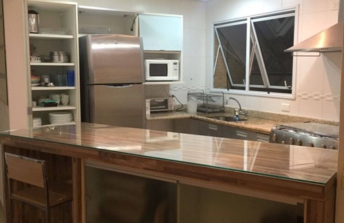 Riviera de Sao Lourenco Apartamento | Belleza Apto - 3 Dorm + 1Empr a 20 metros de la Playa