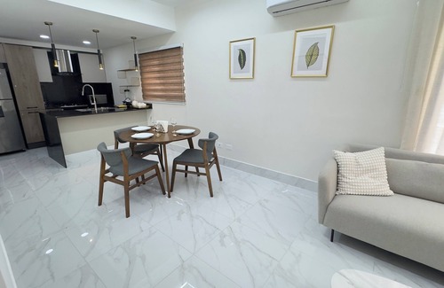 Yolanda Morales Apartamento | Beautiful Apt in Piantini Rooftop Views, Gym & Central