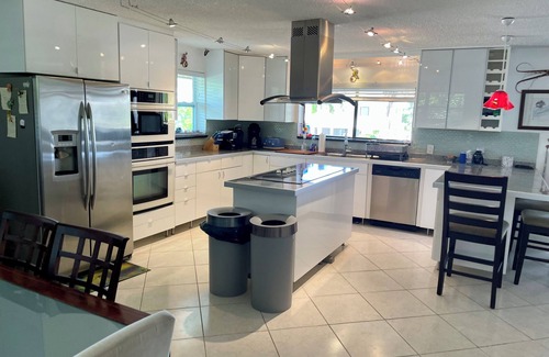 Whispering Pines Casa | Beautiful Canal Front Heated-Chilled Pool 4 Bdr Home. Sep-Oct-Nov 2025 Available