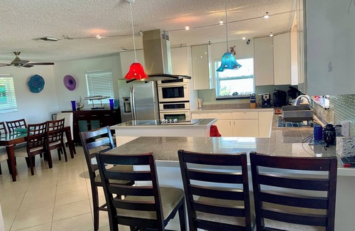 Whispering Pines Casa | Beautiful Canal Front Heated-Chilled Pool 4 Bdr Home. Sep-Oct-Nov 2025 Available