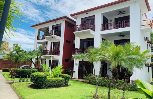 Cerro Plano Condominio | Beautiful Condo garden and pool views, a few steps from Jaco Beach